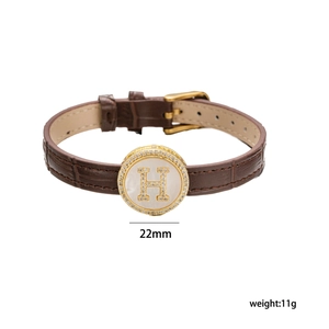 Bamboo pattern brown leather bracelet with 22mm golden H pendant and pearl inlay