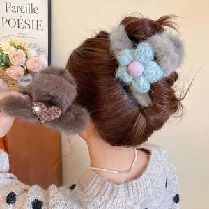 Winter plush claw clips featuring leopard heart and knit flower for elegant hair styling