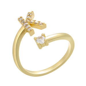 Macro detail of gold-plated letter K ring featuring micro-pave cubic zirconia and round stone
