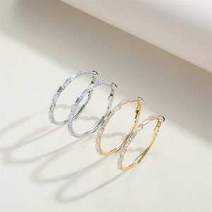Hoop earrings in gold and silver plating with baguette-cut cubic zirconia crystals