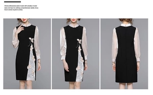 Dettagli dell'abito cheongsam nero con ricamo floreale e maniche lunghe in organza