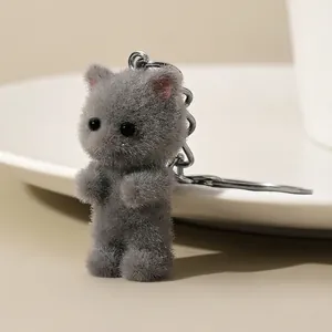 Cute gray flocked resin 3D cat keychain with soft long fiber texture and silver metal ring