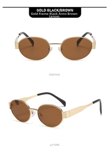 Detail view of oval sunglasses with gold metal frames and tea-colored lenses