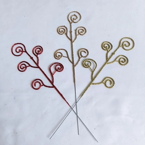 Glittery spiral Christmas picks in red, gold, and rose gold for festive party decoration