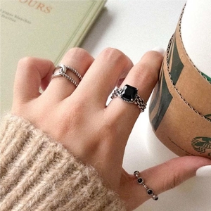 Retro 925 silver rings set with black zircon stones in a minimalist vintage style