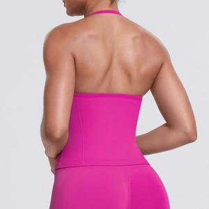 Detailed back view of hot pink halter yoga top and high-waist leggings sports set