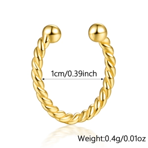 Detail of 925 silver twisted cuff earring with gold plating and 1cm inner diameter