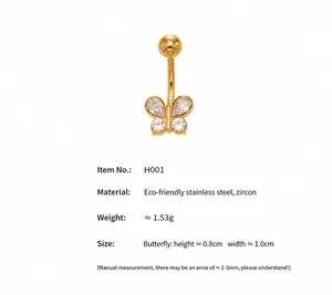 Macro detail of golden butterfly belly ring with zircon inlays and stainless steel dimensions