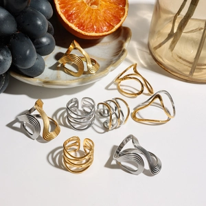 Minimalist stainless steel ring set with abstract wave and multilayer line designs