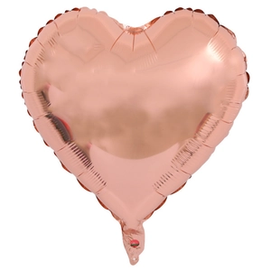 Detail of rose gold heart-shaped foil balloon with smooth metallic texture for parties