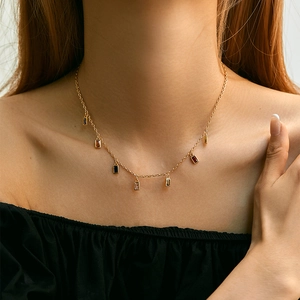 Elegant gold choker necklace featuring colorful geometric zircon waterdrop pendants