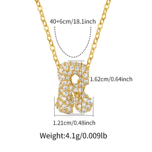 Detail view of gold letter R pendant with cubic zirconia and chain size measurements
