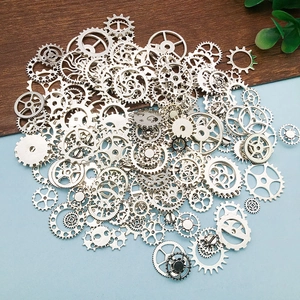 Close-up of silver steampunk metal gears and vintage alloy accessories for DIY crafts