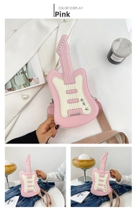 Detail view of pink guitar-shaped crossbody bag with chic wide strap and star rivets