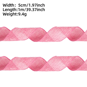 Pink faux linen ribbon detail with 5cm width measurement and wired edge texture
