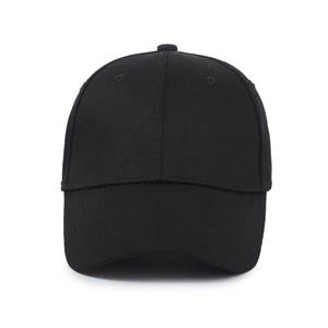 Detailed view of the black twill fabric texture and stitched seams on the kids baseball cap