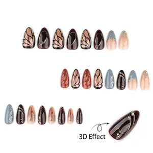 Short almond press-on nails featuring 3D butterfly texture and cat-eye effect with gold foil