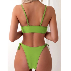 Rear view of vibrant lime green two-piece bikini featuring thin straps and side-tie details