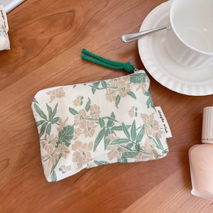 Floral cotton mini storage pouch with zipper and green knot for coins or lipstick