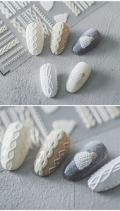 Macro shot of 3D knit sweater texture nail stickers with winter embossed patterns