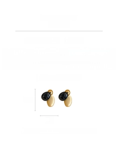 Detail view of oval drop earrings with black beads and gold alloy metal components