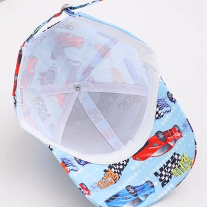 Blue kids baseball cap with speed racer car prints and contrast bill shown from inside