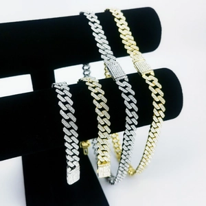 Luxury iced-out Cuban link necklaces in gold and silver finish with full diamond inlay