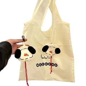 Foldable cartoon dog eco-friendly shopping bag with matching storage pouch in beige color