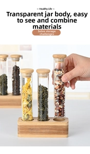 Detailed view of glass storage tubes with wooden stoppers on a natural wood display base