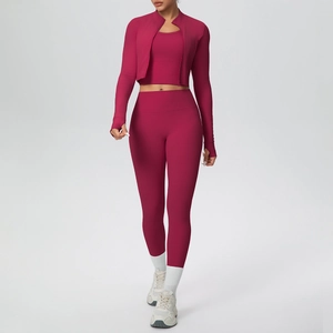 Close-up of berry red high-elastic yoga set showing zipper jacket and sports vest texture