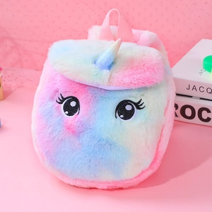 Rainbow plush unicorn backpack with glitter horn and embroidery on pink background