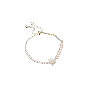 Silver flower charm bracelet with white pearls and adjustable slider closure for women