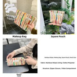 Close-up of rainbow striped canvas makeup bags with textured fabric and zipper details