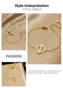 Detailed view of gold-plated bracelet with pavé-set geometric bars and link chain