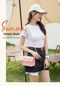 Detailed view of women's crossbody bag featuring a pearl pendant and pink-beige patchwork