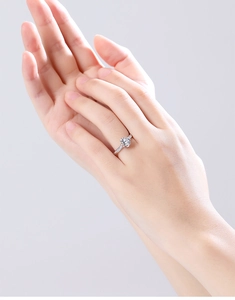 Close-up of elegant S925 silver moissanite ring featuring a six-prong solitaire setting
