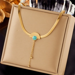 Gold snake chain necklace with fan-shaped turquoise pendant and delicate tassel details