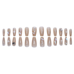 Faux ongles papillon scintillants avec dégradé nude et breloques papillon aurore 3D