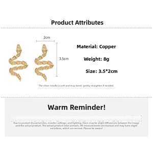 Detailed size view of snake-shaped gold drop earrings with white zircon crystals