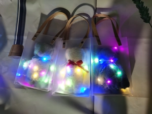 Detail of bear towel gift set with LED lights and transparent PVC handle bag