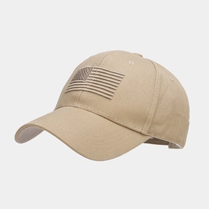Detail shot of khaki baseball cap with embroidered American flag and premium stitching