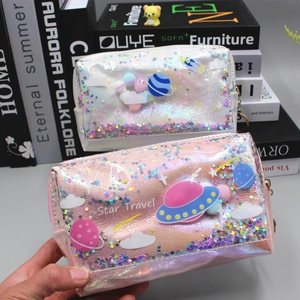 Holographic Star Travel makeup pouch with flowing glitter and metallic zipper detail