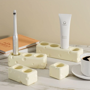 Creative cheese-shaped silicone mold for toothbrush and toothpaste holder storage