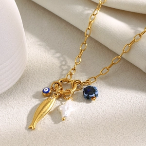18K gold plated stainless steel necklace with fish, star, and evil eye charms