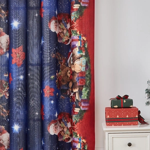 Detail of Christmas themed curtain featuring Santa and Teddy Bear patterns for holiday decor