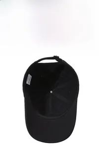 Internal view of black baseball cap showing six-panel stitching and JSMY brand label