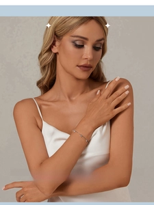 Delicate S925 sterling silver beaded bracelet with shimmering cubic zirconia on model