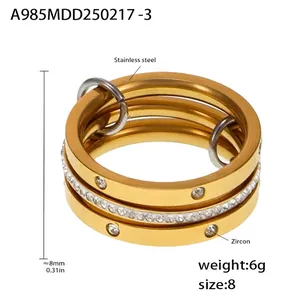 Detail of 8mm gold-plated stainless steel layered ring set with sparkling zircon stones