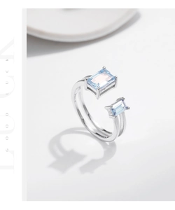 Detailed macro shot of S925 sterling silver ring featuring a blue rectangular gemstone