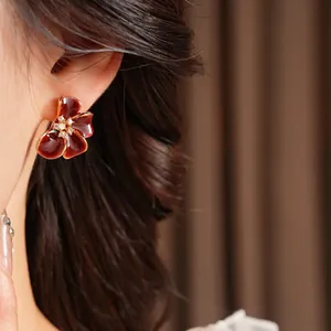 Vintage red enamel flower stud earrings with zircon centers in gold plating for women